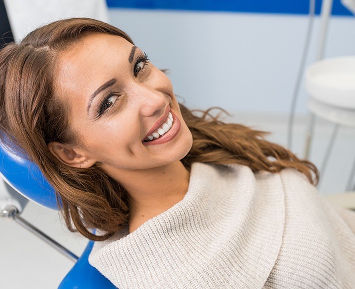 Woman's beautiful smile after teeth whitening