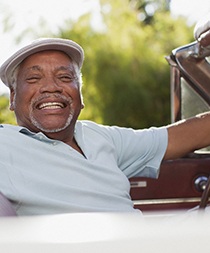 Man with implant dentures in Gilbert