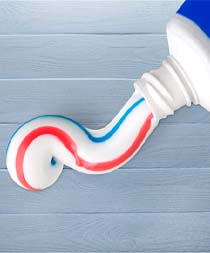 Closeup of toothpaste for preventing toothaches in Gilbert