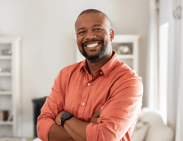 Man smiling after sedation dentistry appointment