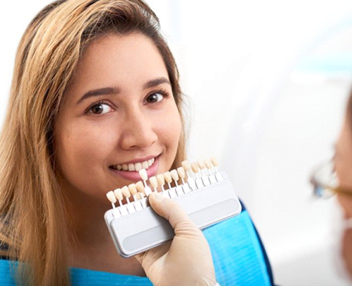 young woman getting veneers in Gilbert