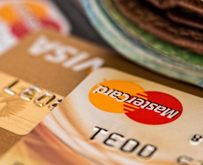 Credit cards and wallet on desk