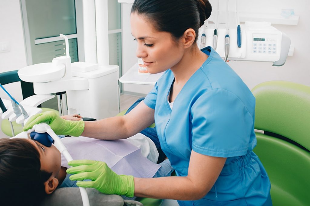 Patient at dentist receiving nitrous oxide sedation.